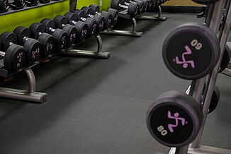 Image showcasing the REGUPOL sonusfit m520 flooring, ensuring acoustic performance can be achieved in the Anytime Fitness facility.