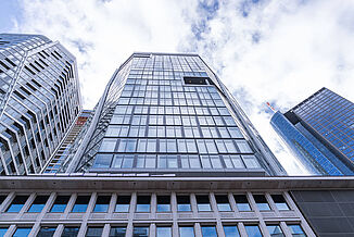 Partial view of the glass façade of The Four in Frankfurt.