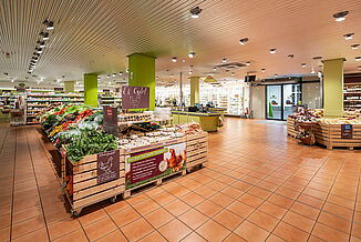 Shopping area with fresh fruit and vegetables in the Alnatura supermarket in Frankfurt.